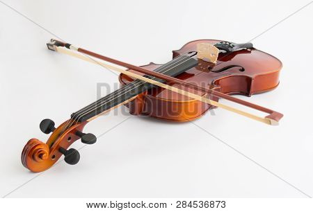 Violin with bow in white background or fiddle in white background