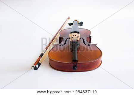 Violin with bow in white background or fiddle in white background