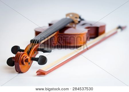 Violin with bow in white background or fiddle in white background