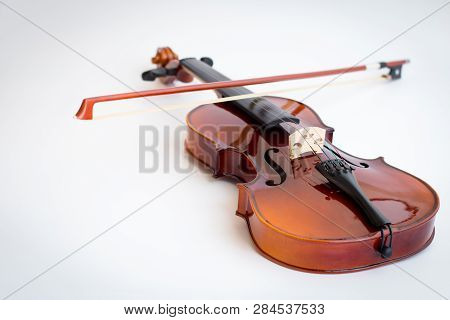 Violin Or Viola With Bow In White Background. Fiddle In White Background