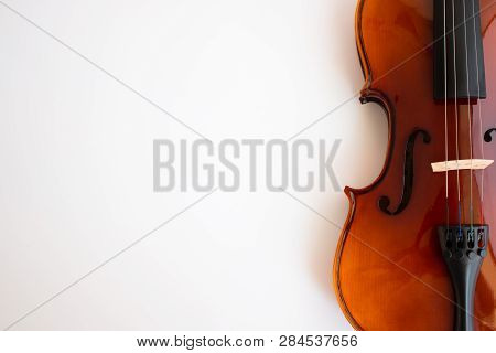 Violin with bow in white background or fiddle in white background