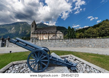 The Ancient Church Of San Vigilio (1515 - Famous For The Fresco The Macabre Dance) And The War Canno