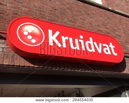 Heeze, The Netherlands - February 16, 2019: Red Shop Entrance Logo Of Dutch Pharmacy And Drugstore C