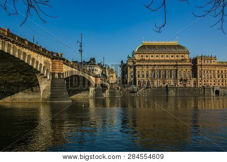 Prague, Czech Republic / Europe - February 16 2019: View Of National Theatre Standing On Riverbank O