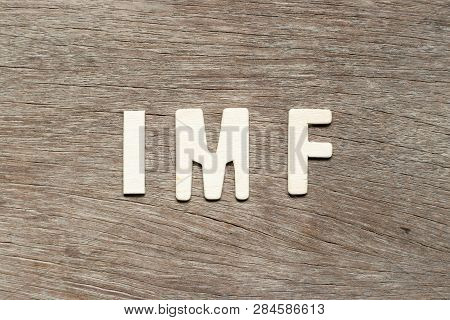Alphabet Letter In Word Imf (abbreviation Of  International Monetary Fund) On Wood Background