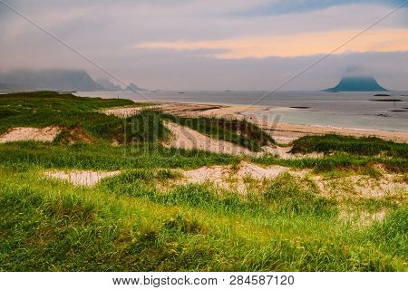 Seascape, Sea Coast With Grassy Dunes And Island Bleiksoya In The Distance, View From Kleivodden Vie