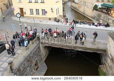 Prague, Czech - April 24, 2012: This Is A Bridge Across The Chertovka Canal To Kampa Island With A C
