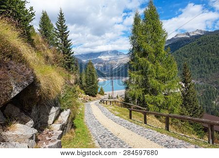 View Of The Dam And The Lake Bissina. Lago Di Malga Bissina. Trentino-alto Adige. Italy