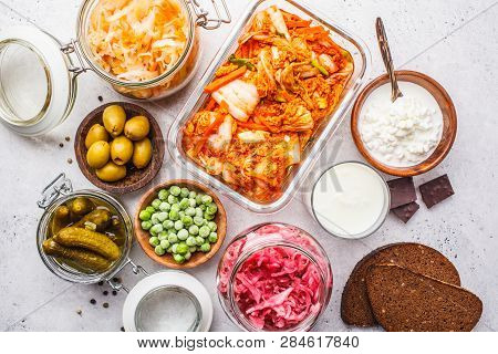 Probiotics Food Background. Kimchi, Beet Sauerkraut, Sauerkraut, Cottage Cheese, Olives, Bread, Choc