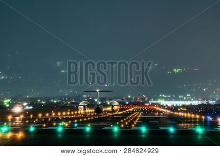 Propeller Plane Taking Off Scene In The Night.