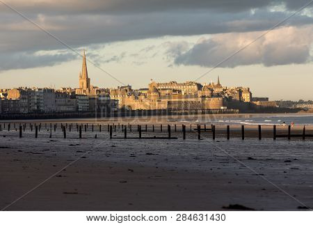 The Morning Light On The Plage Du Sillon And Walled City. Saint Malo , France, Ille Et Vilaine, Emer
