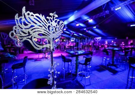 Silver Masquerade Mask As Decoration At Gala Dinner Event