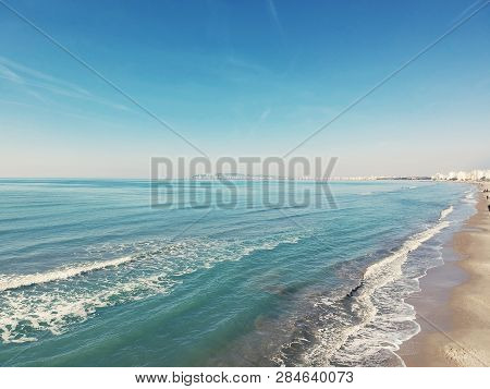 Top View Aerial Of An Amazingly Beautiful Seascape With Turquoise Water In Durres, Albania And Sandy