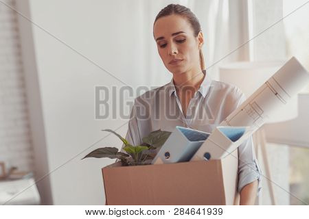 Portrait Of Sad Unemployed Woman With Collected Hair