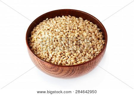 Barley Grain (hordeum Vulgare) In Wooden Bowl Isolated On White Background