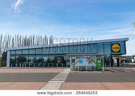 Mouscron,belgium-february 17,2019: View Of Lidl Supermarket And Logo.lidl Stiftung & Co. Kg  Is A Ge