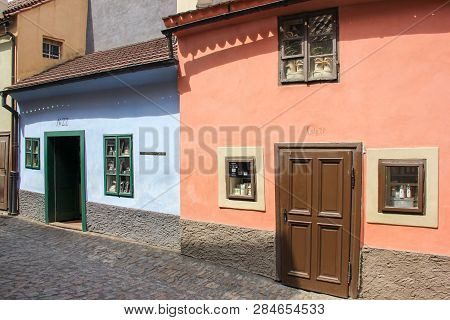 Prague, Czech Republic - May 2016: Little Light Blue And Pink Houses On Golden Lane Street Inside Of
