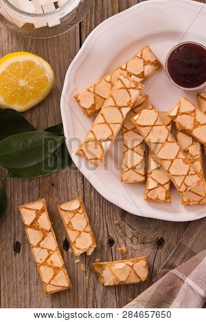 Puff Pastry Cookies With Jam On White Dish.