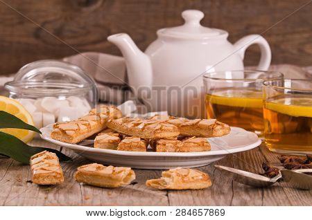 Puff Pastry Cookies With Jam On White Dish.