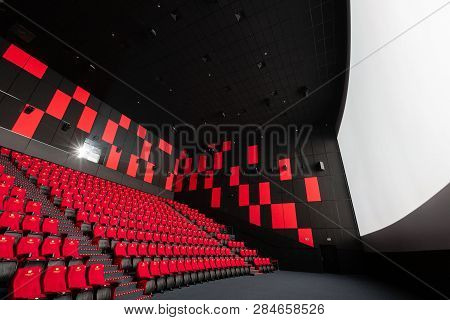 Russia, Nizhny Novgorod - November 14, 2016: Cinema Imperia Grez Nebo, Dolby Atmos. Empty Red Cinema