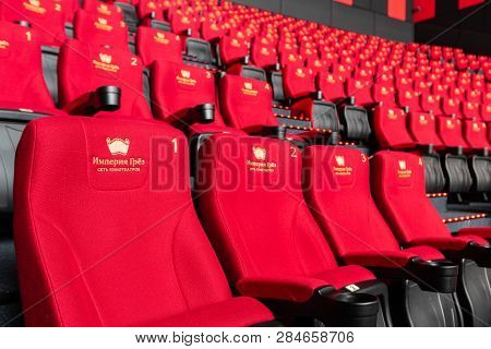 Russia, Nizhny Novgorod - November 14, 2016: Cinema Imperia Grez Nebo, Dolby Atmos. Empty Red Cinema