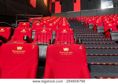 Russia, Nizhny Novgorod - November 14, 2016: Cinema Imperia Grez Nebo, Dolby Atmos. Empty Red Cinema