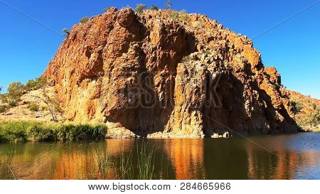 The Large Rocky Outcrop At Glen Helen Gorge In The West Macdonnell Ranges
