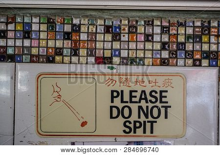 George Town, Malaysia - Mar 10, 2016. Warning Sign Of Do Not Spit (no Spitting) On The Wall In Local