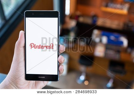 Chiang Mai, Thailand - April 21,2018: Woman Holding Huawei Mobile Phone With Pinterest Apps On Scree