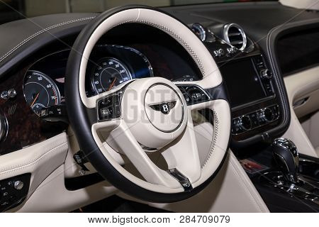 Novosibirsk, Russia - 08.01.18: Interior View With Steering Wheel Of Luxury Very Expensive New Black