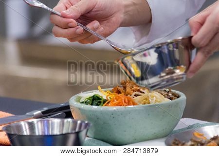 Bibimbap, Traditional Korean Cuisine Bibimbap, Chef Preparing Korean Food, Chef Cooking In Kitchen