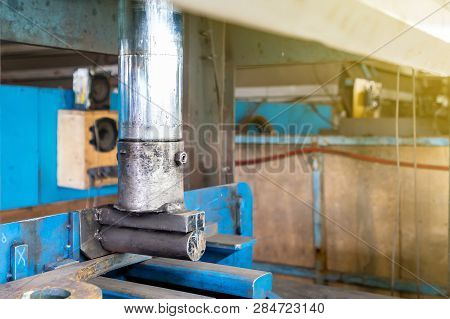 Close Up Product During Press Down By Manual Hydraulic Bending Machine At Factory