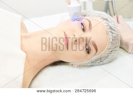 Light Therapy Procedure. Heal Beauty Treatment. Woman Facial Device. Anti Age And Wrinkle