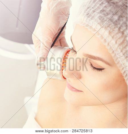 Light Therapy Procedure. Heal Beauty Treatment. Woman Facial Device. Anti Age And Wrinkle