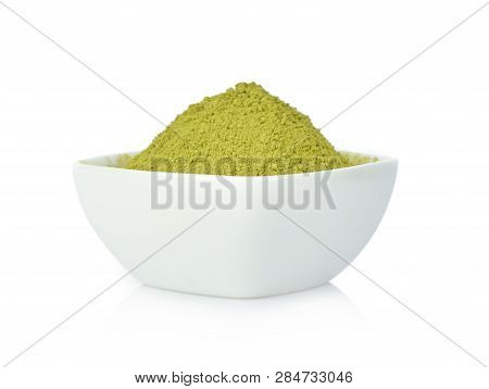 Matcha Green Tea Powder In White Bowl On White Backgorund