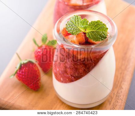 Delicous And Nutritious Double Color (colour) Strawberry Desserts With Mint And Diced Sarcocarp Topp