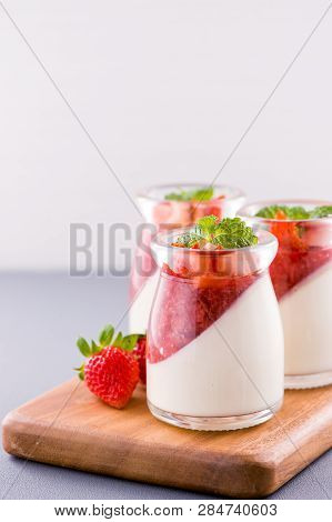 Delicous And Nutritious Double Color (colour) Strawberry Desserts With Mint And Diced Sarcocarp Topp