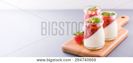 Delicous And Nutritious Double Color (colour) Strawberry Desserts With Mint And Diced Sarcocarp Topp