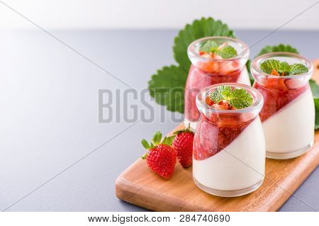 Delicous And Nutritious Double Color (colour) Strawberry Desserts With Mint And Diced Sarcocarp Topp