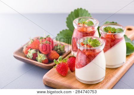 Delicous And Nutritious Double Color (colour) Strawberry Desserts With Mint And Diced Sarcocarp Topp