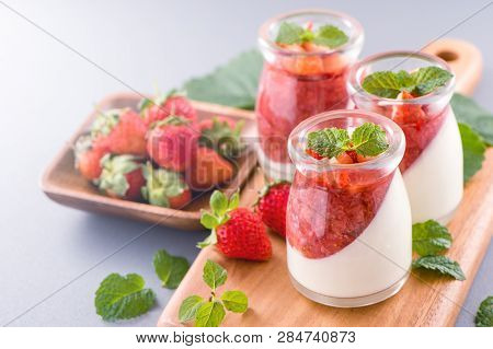 Delicous And Nutritious Double Color (colour) Strawberry Desserts With Mint And Diced Sarcocarp Topp