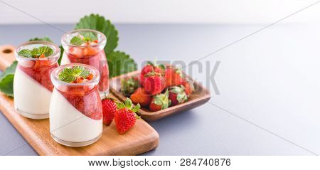 Delicous And Nutritious Double Color (colour) Strawberry Desserts With Mint And Diced Sarcocarp Topp