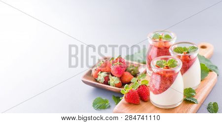 Delicous And Nutritious Double Color (colour) Strawberry Desserts With Mint And Diced Sarcocarp Topp
