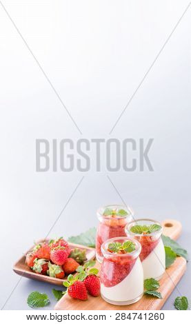 Delicous And Nutritious Double Color (colour) Strawberry Desserts With Mint And Diced Sarcocarp Topp
