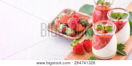 Delicous And Nutritious Double Color (colour) Strawberry Desserts With Mint And Diced Sarcocarp Topp