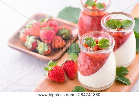 Delicous And Nutritious Double Color (colour) Strawberry Desserts With Mint And Diced Sarcocarp Topp