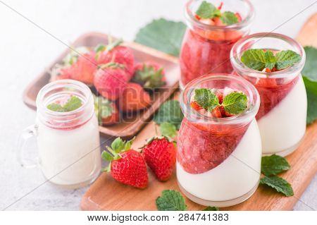 Delicous And Nutritious Double Color (colour) Strawberry Desserts With Mint And Diced Sarcocarp Topp
