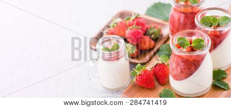 Delicous And Nutritious Double Color (colour) Strawberry Desserts With Mint And Diced Sarcocarp Topp