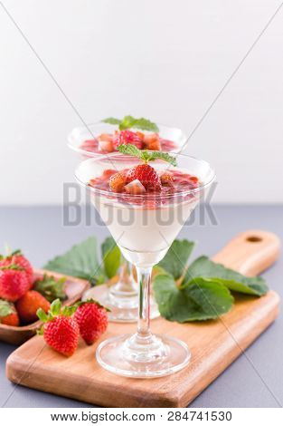 Delicous And Nutritious Double Color (colour) Strawberry Desserts With Mint And Diced Sarcocarp Topp