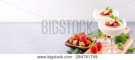Delicous And Nutritious Double Color (colour) Strawberry Desserts With Mint And Diced Sarcocarp Topp